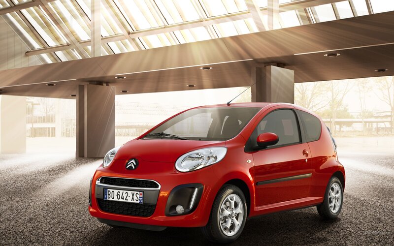 Red Citroën C1 in modern garage