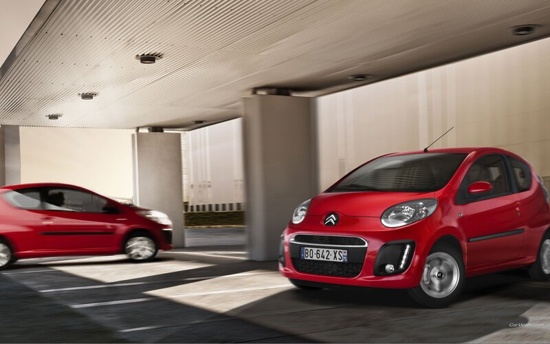 Red Citroën C1 in parking garage