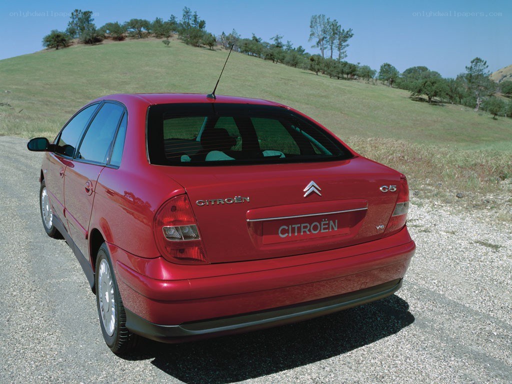 Red Citroën C5 sedan