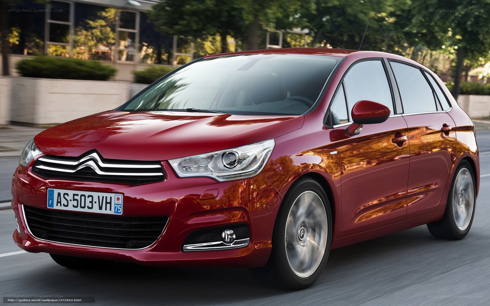 Red Citroen C4 in motion