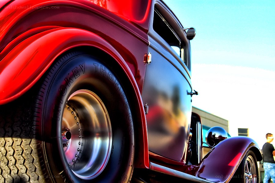 Red classic car at a show