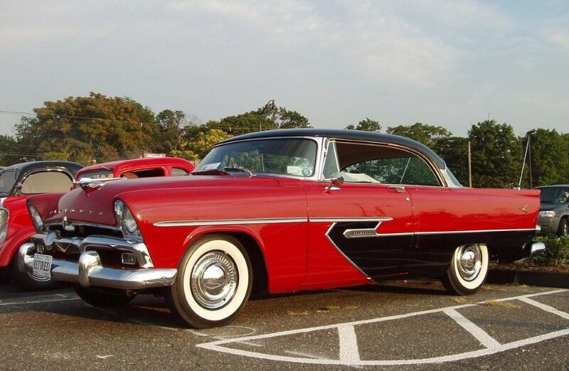 Red classic car at a show