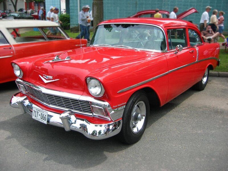 Red classic car at a show