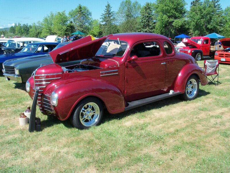 Red classic car at a show