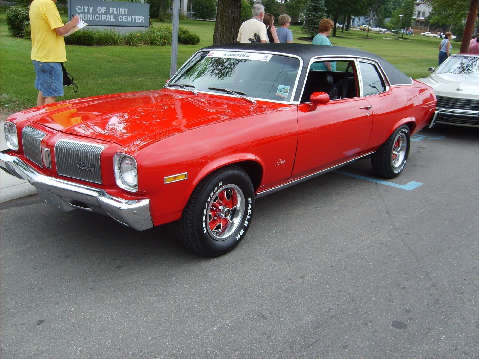Red classic car at a show