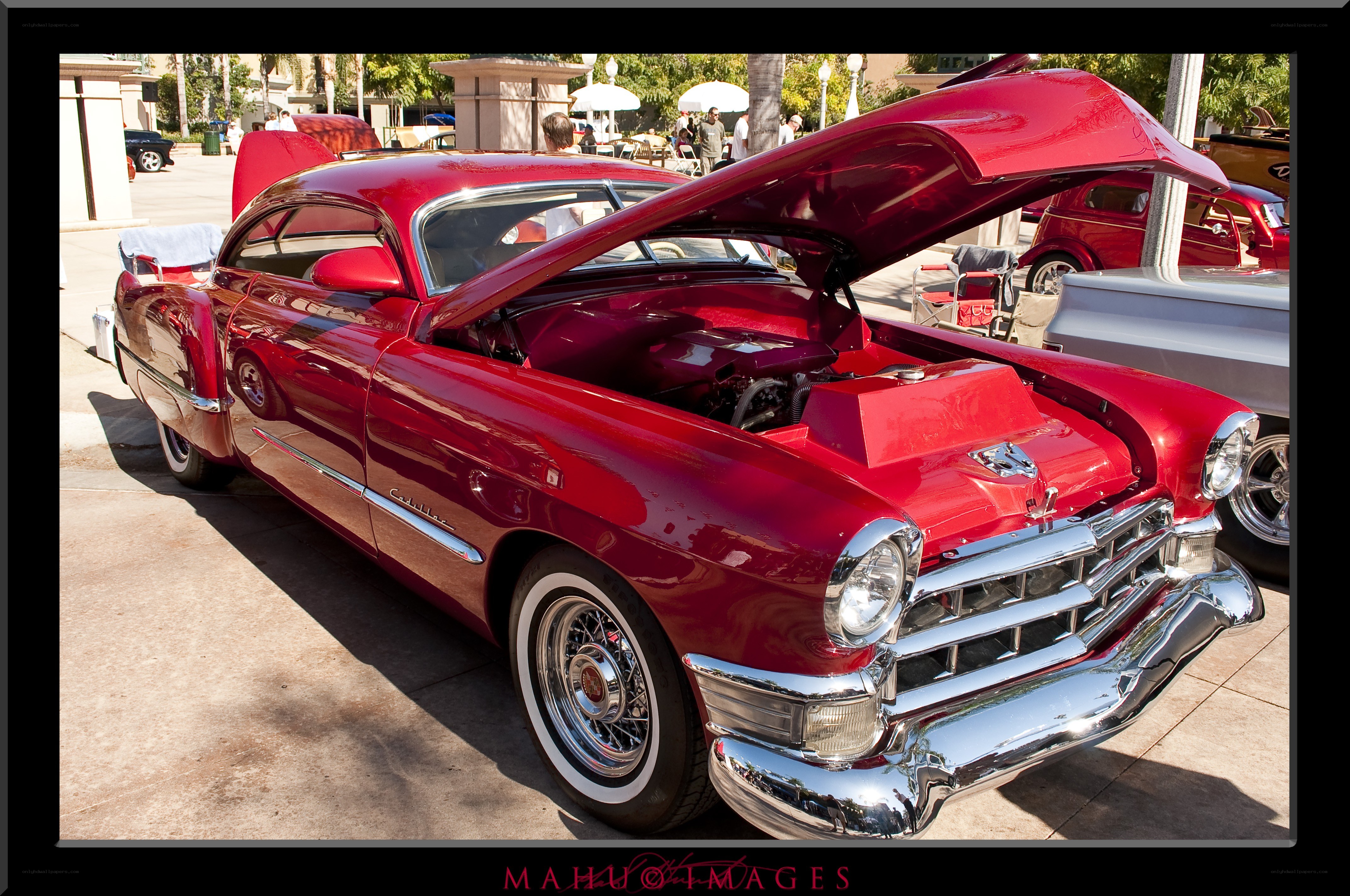 Red classic car at a show