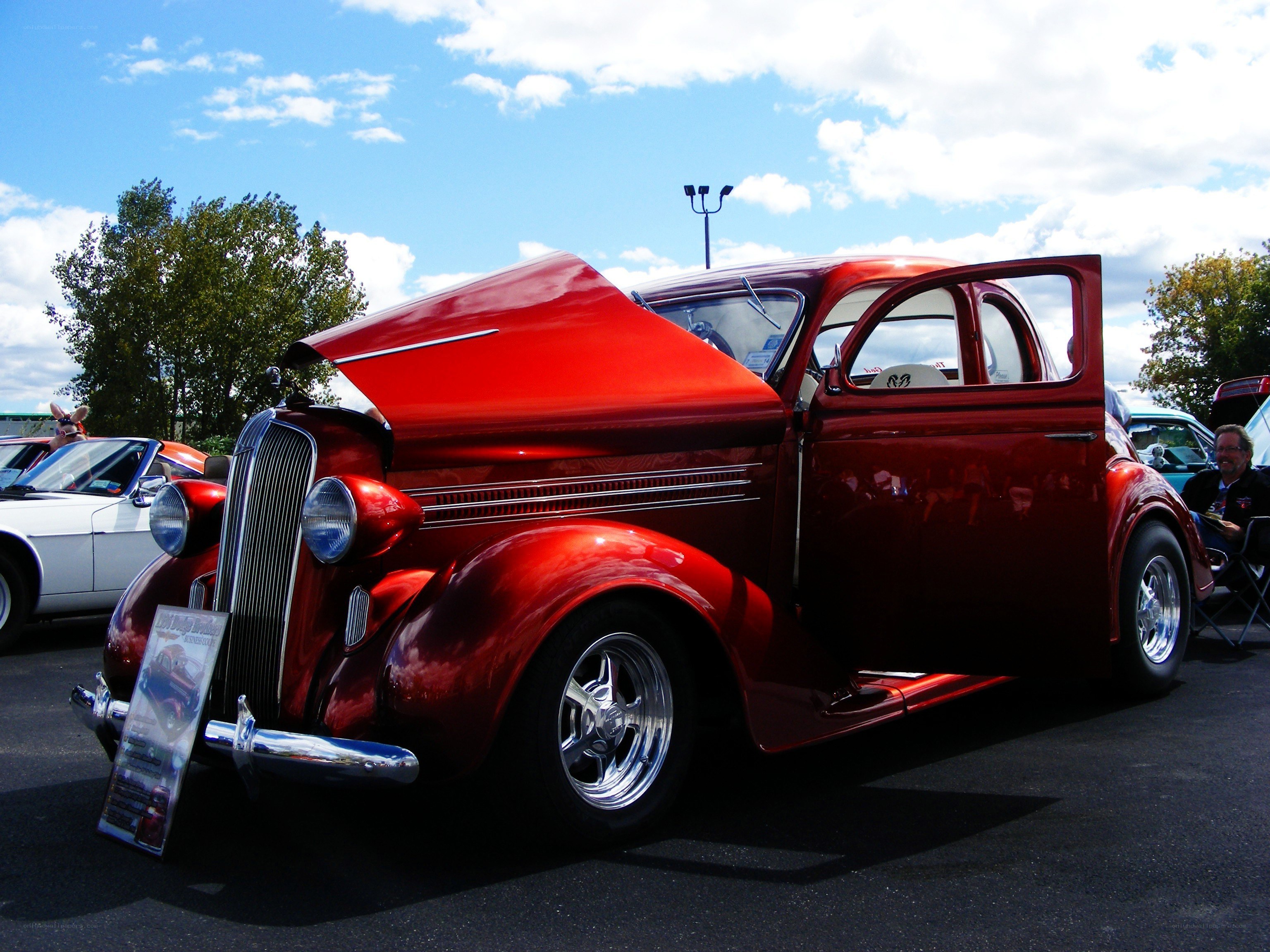 Red classic car at a show