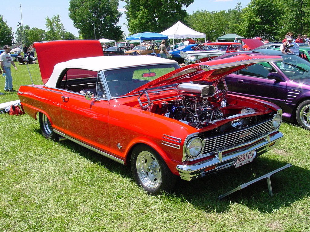 Red classic car at a show