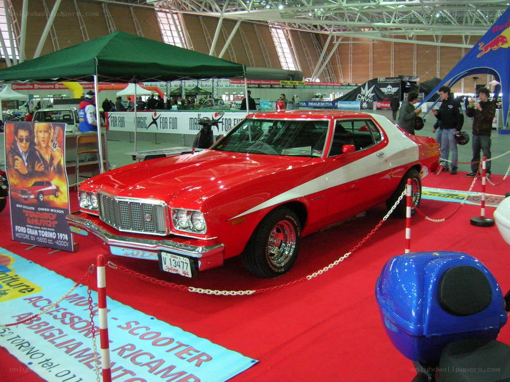 Red classic car at auto show