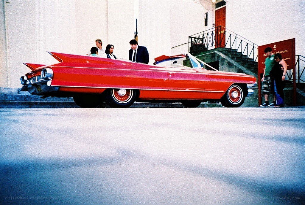 Red classic car at event