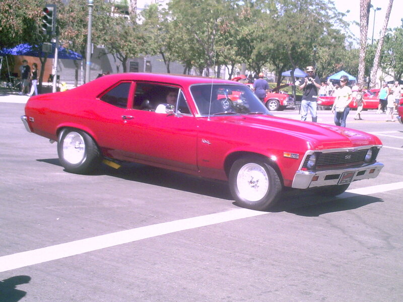 Red classic car at parade