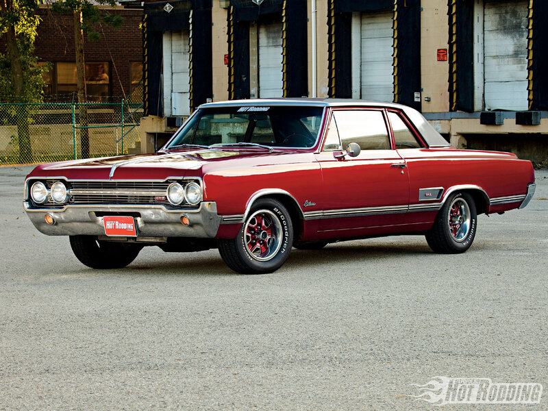 Red Classic Car — Calm, Afternoon, Photograph, Building, Fence