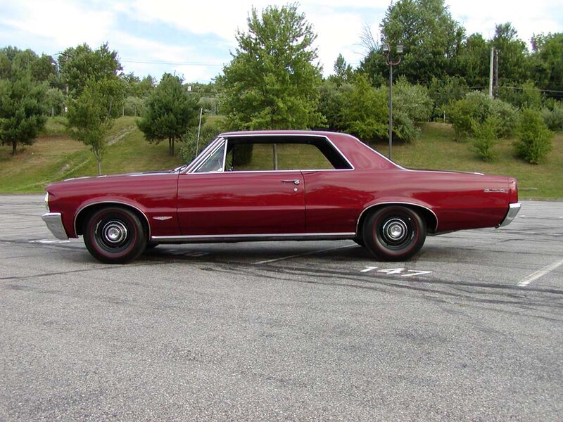 Red Classic Car — Calm, Afternoon, Photograph, Parking Lot, Trees, Sky
