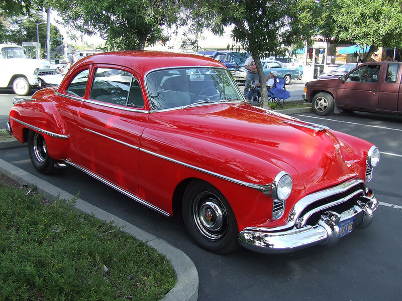 Red Classic Car — Calm, Afternoon, Photograph, Tree, People
