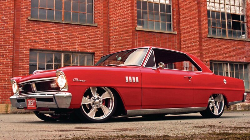 Red Classic Car — Dramatic, Afternoon, Photograph, Brick Building, Windows