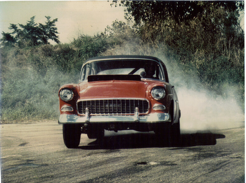 Red classic car drifting
