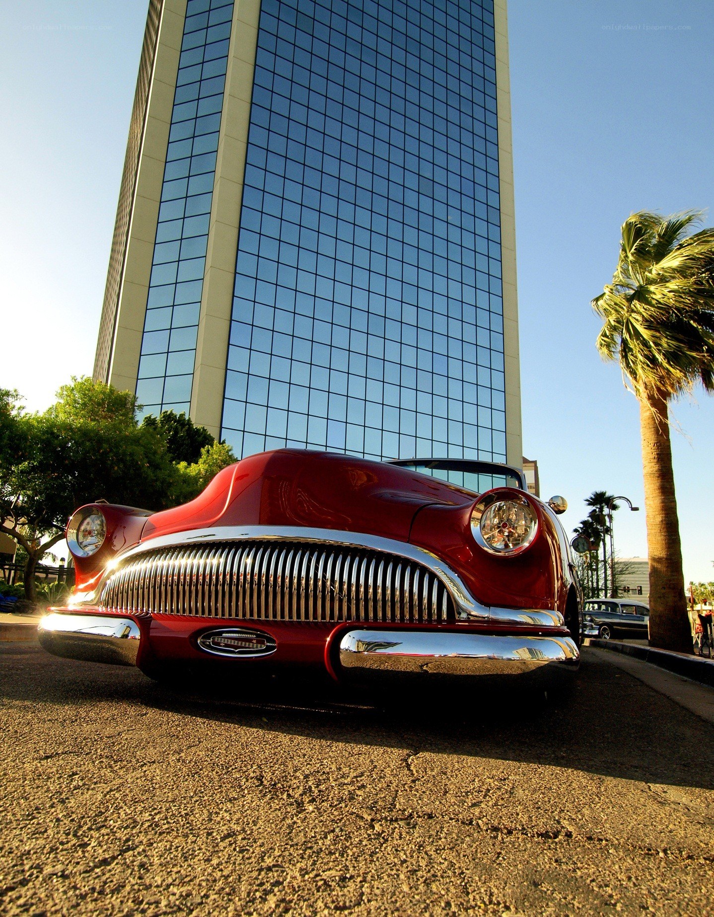 Red classic car in city