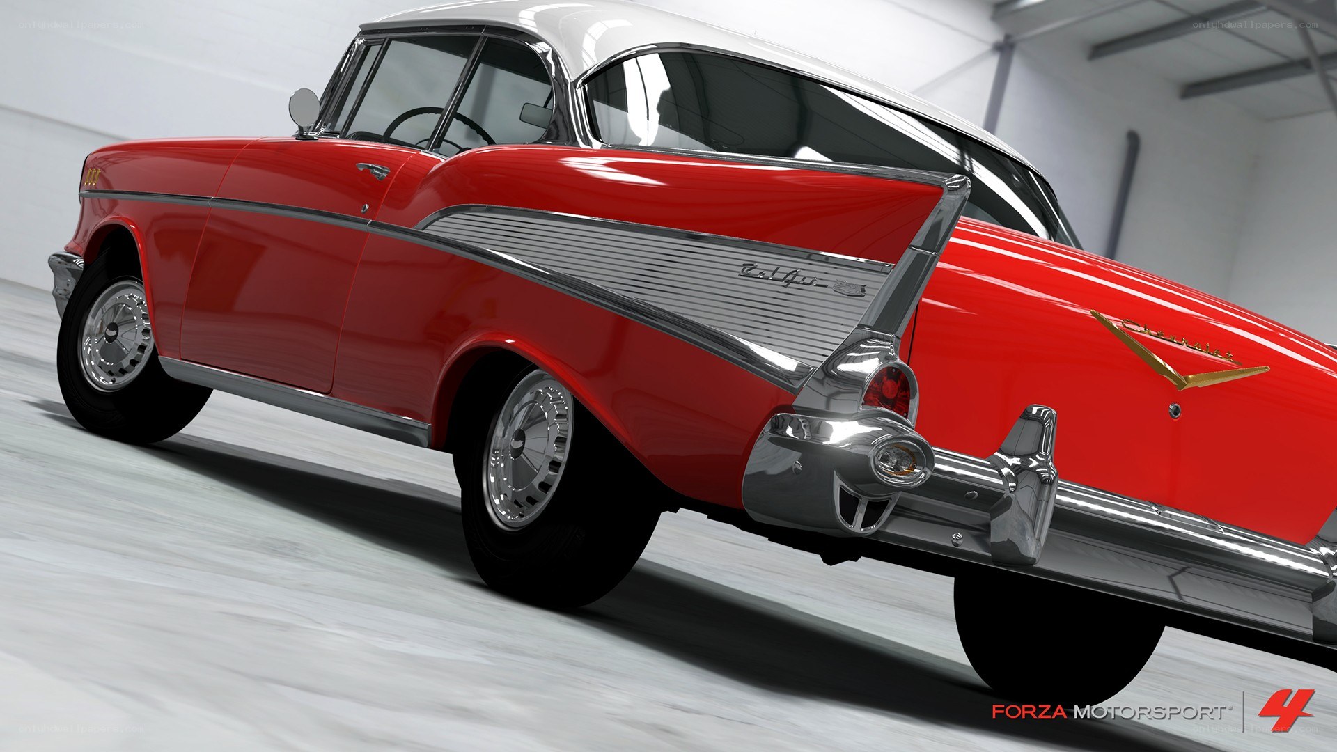 red classic car in garage