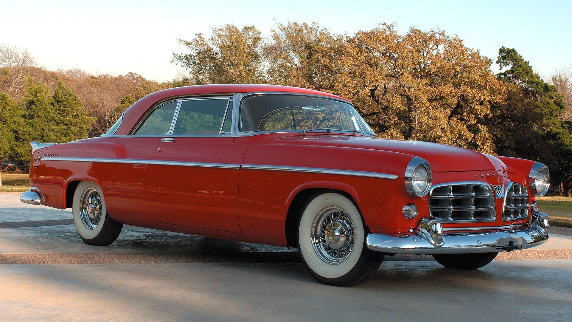 Red classic car in outdoor setting