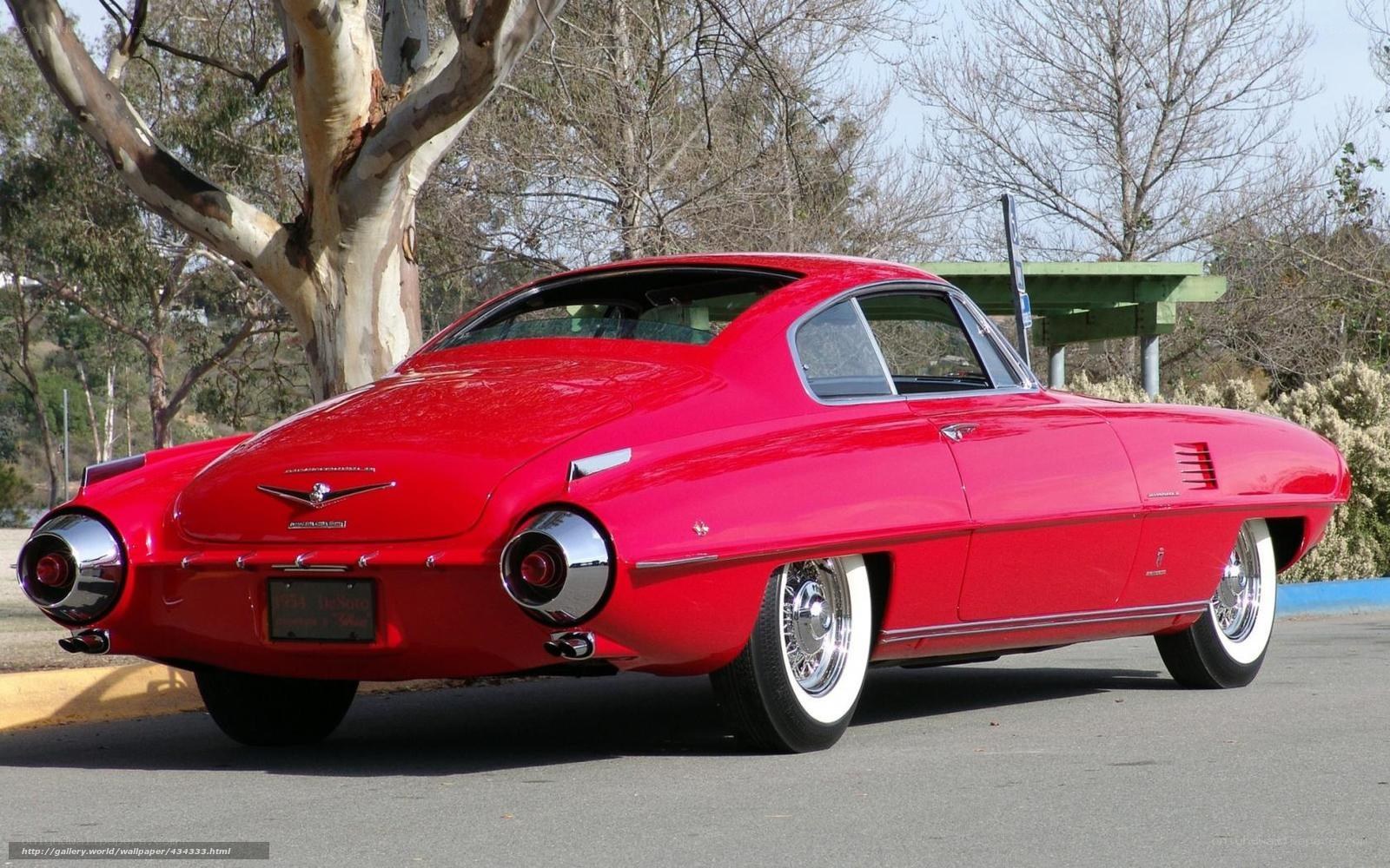 Red classic car in park