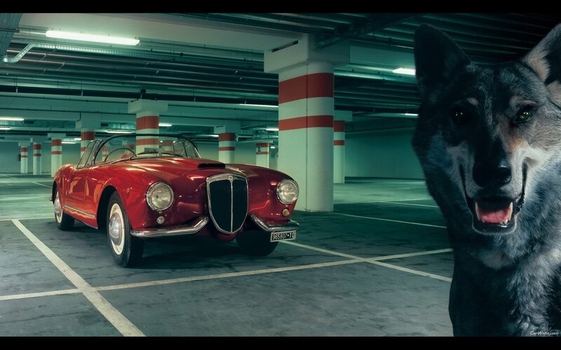 Red classic car in parking garage