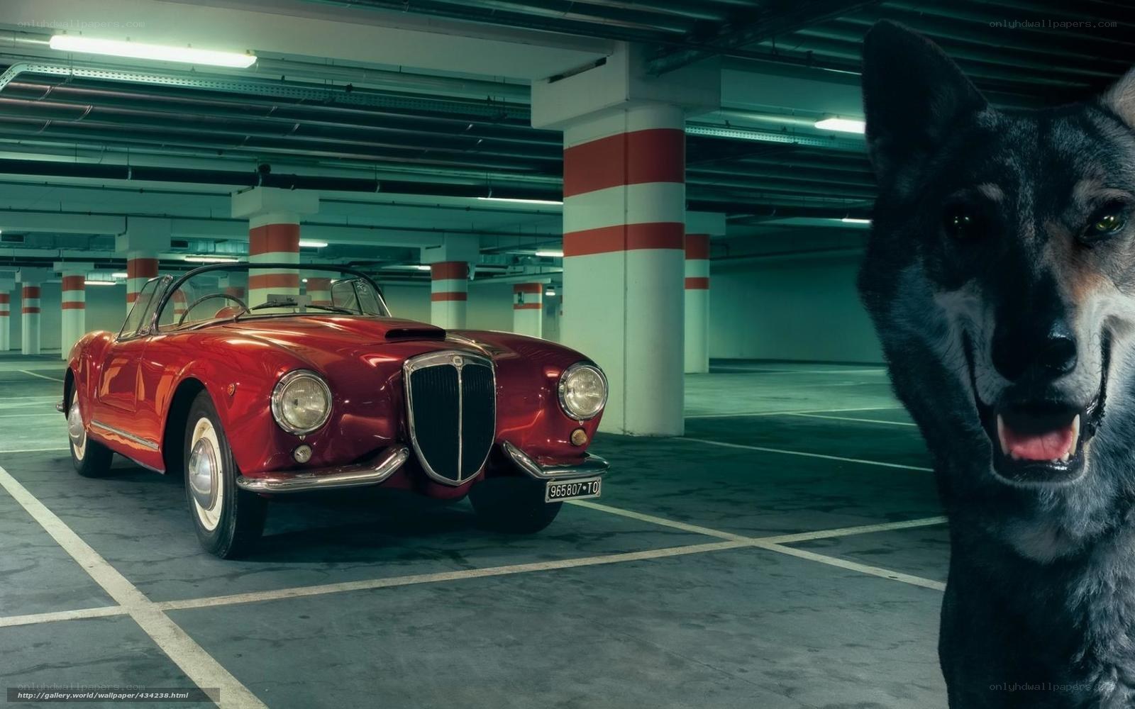 Red classic car in parking garage