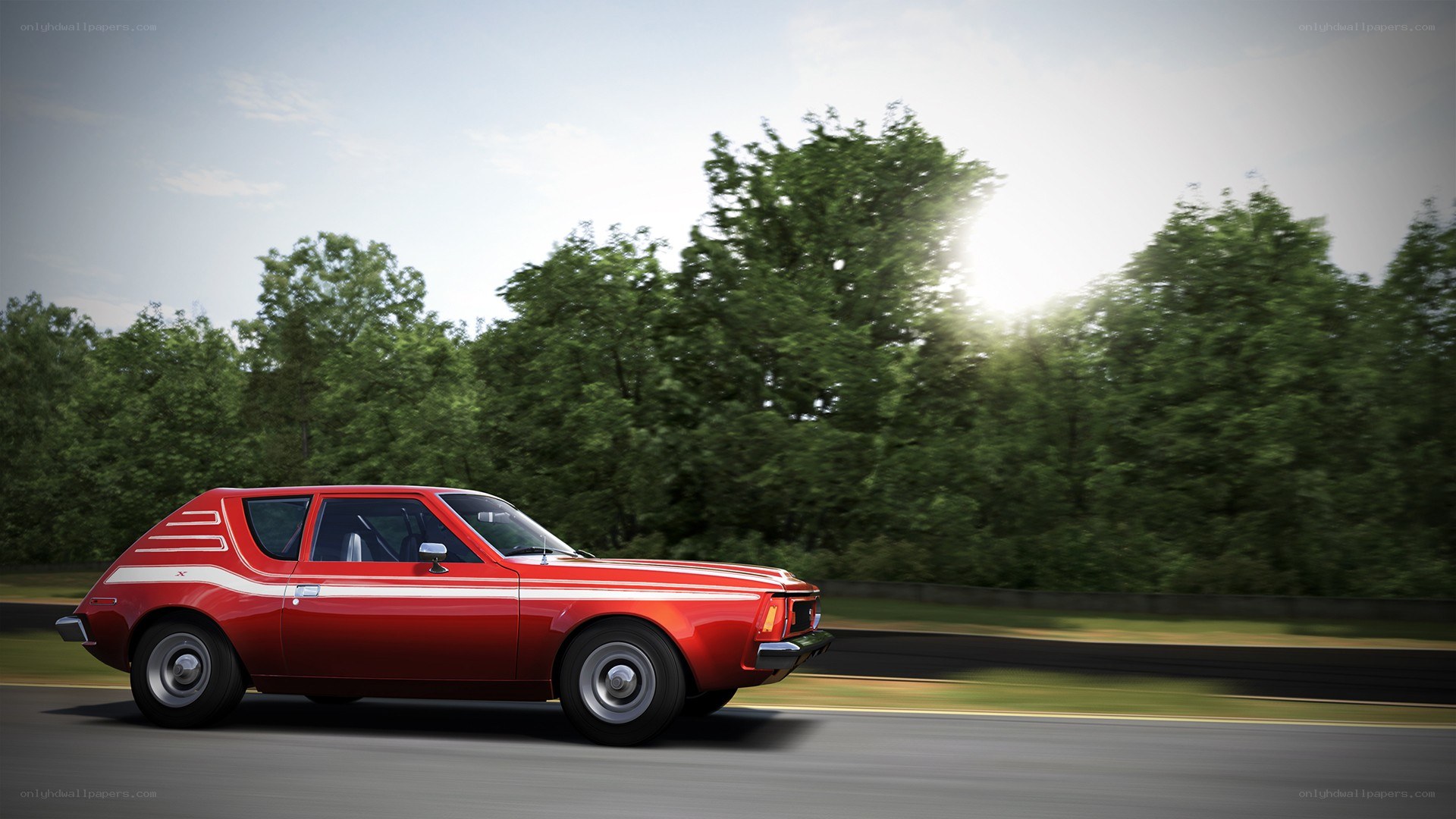 Red classic car on a road