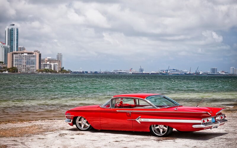 Red Classic Car on Beach — Serene