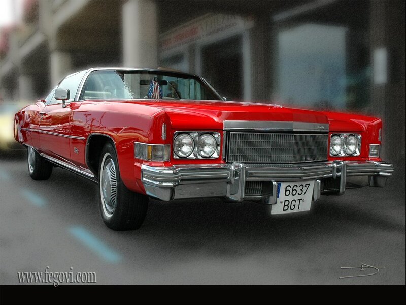 Red classic car on city street