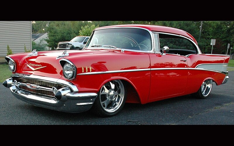 Red classic car on display