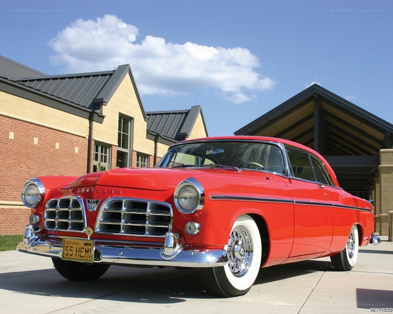 Red classic car on display