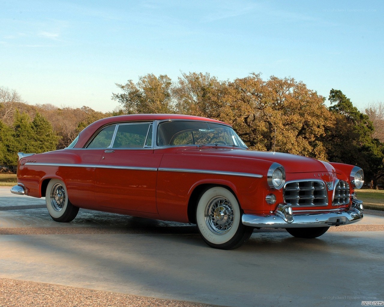 Red classic car on display