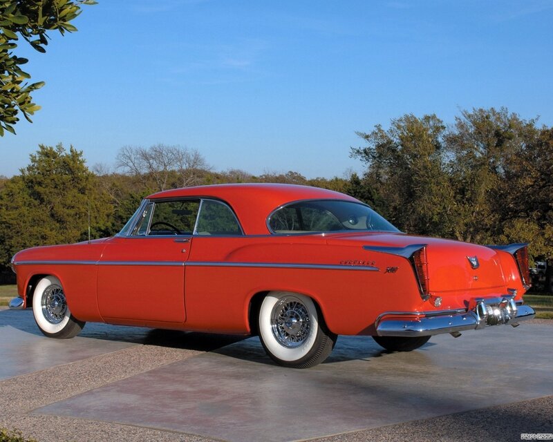 Red classic car on display