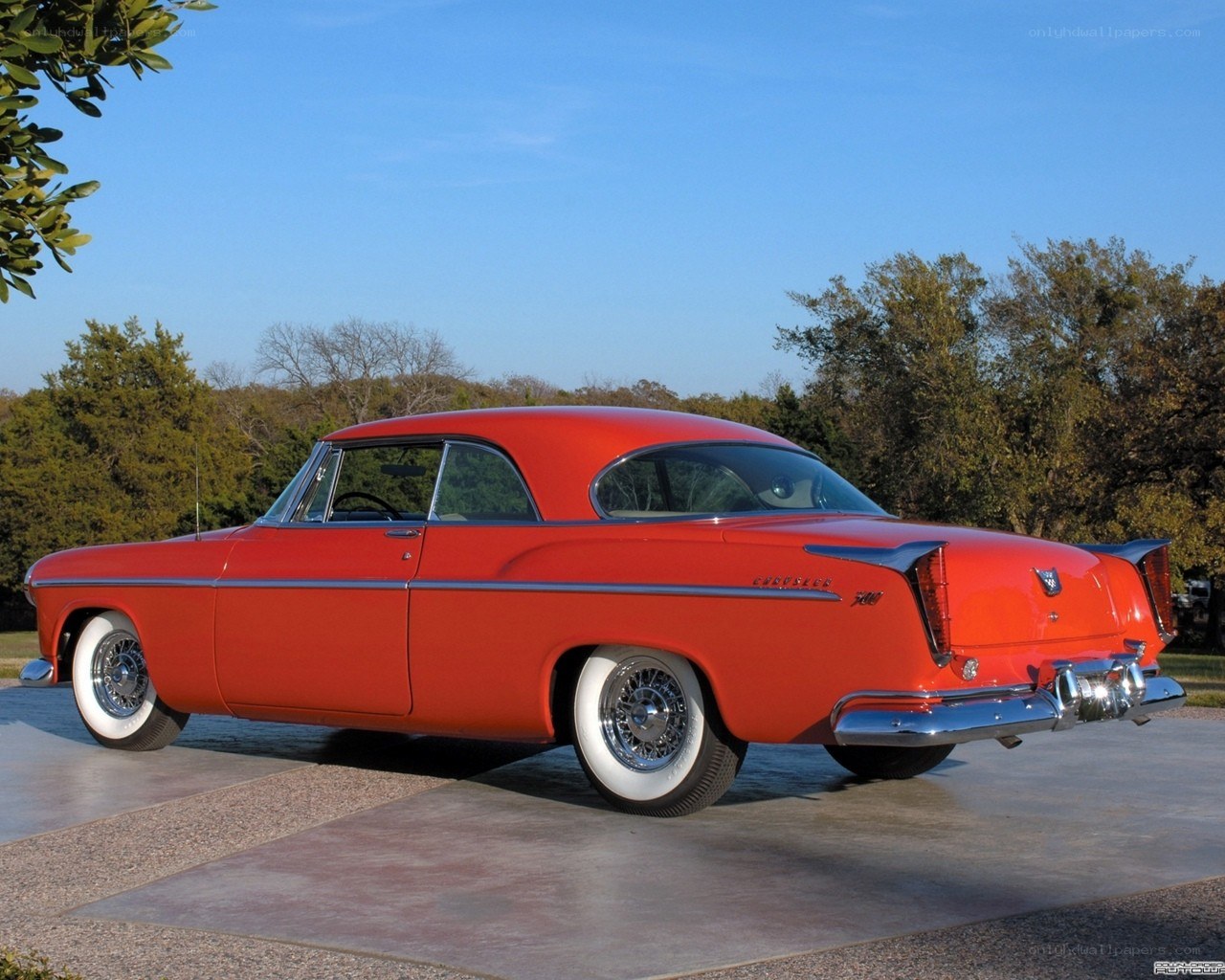 Red classic car on display