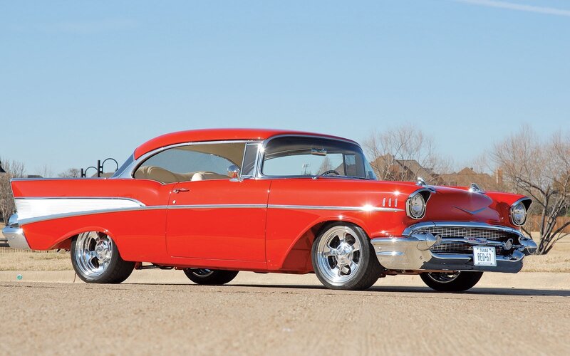 Red classic car on display