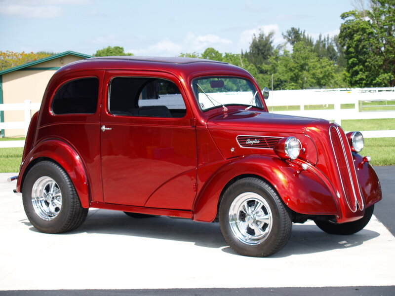 Red classic car on display
