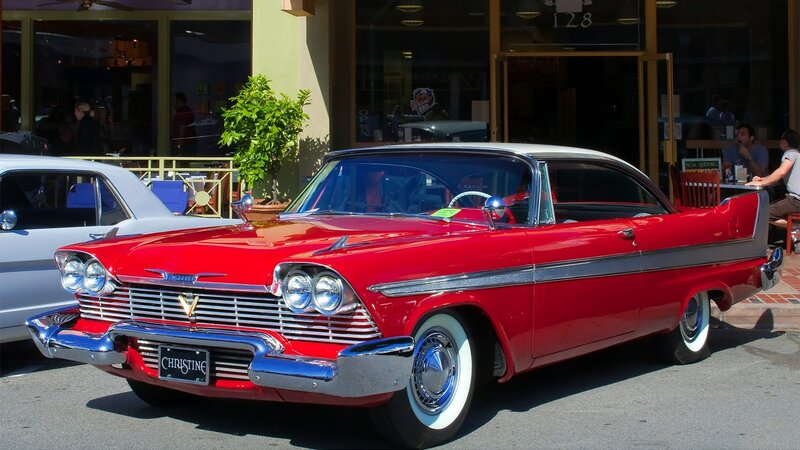 Red classic car on street