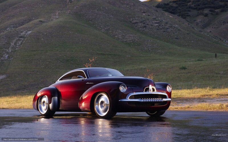 Red classic car on wet road