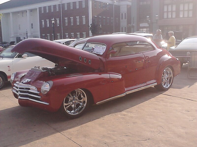 Red Classic Car — Outdoor, Afternoon, Photograph, Car Show, Buildings