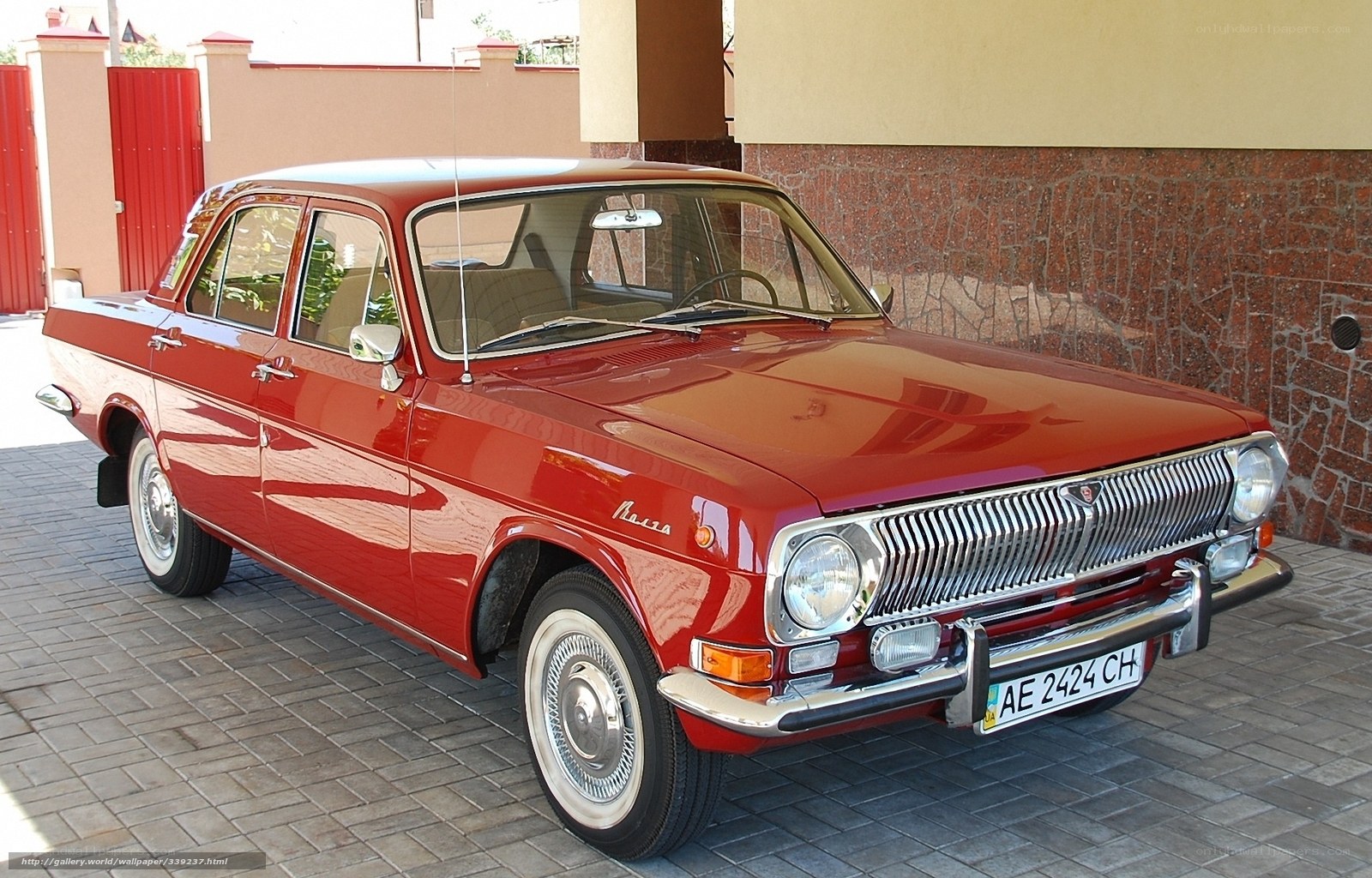 Red classic car parked outside