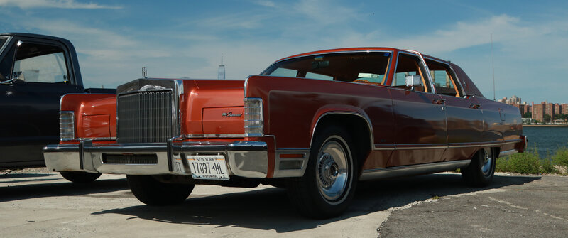 Red Classic Car — Serene, Afternoon, Photograph, Black Truck