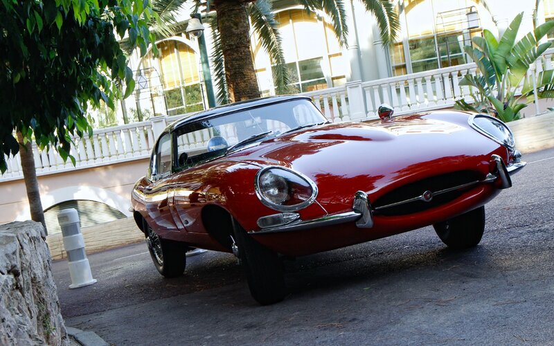 Red Classic Car — Serene, Afternoon, Photograph, Palm Trees, Building
