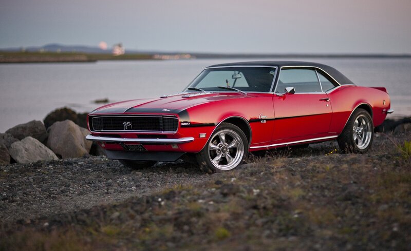 Red Classic Car — Serene, Sunset, Photograph, Rocks