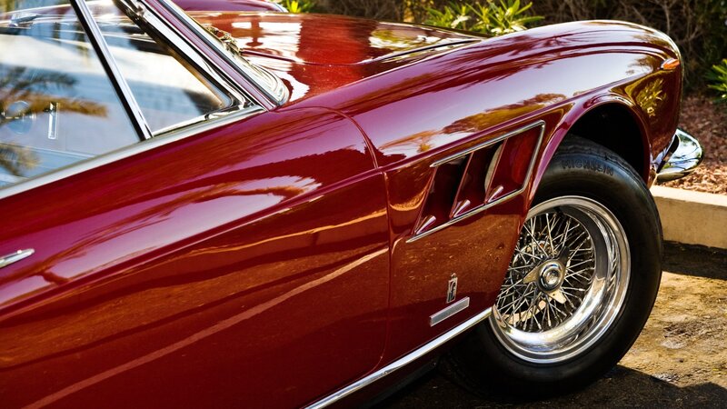Red classic car side view