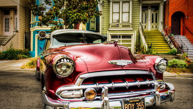 Red Classic Car — Vibrant, Afternoon, Photograph, Houses