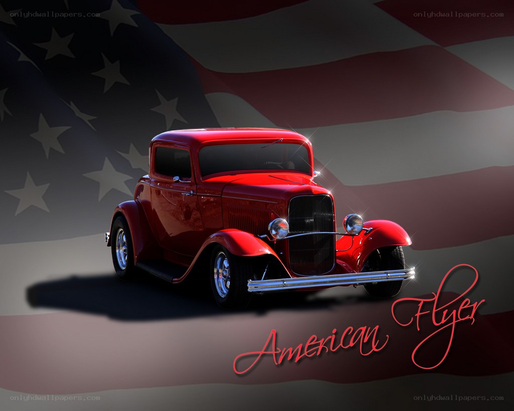 Red classic car with American flag