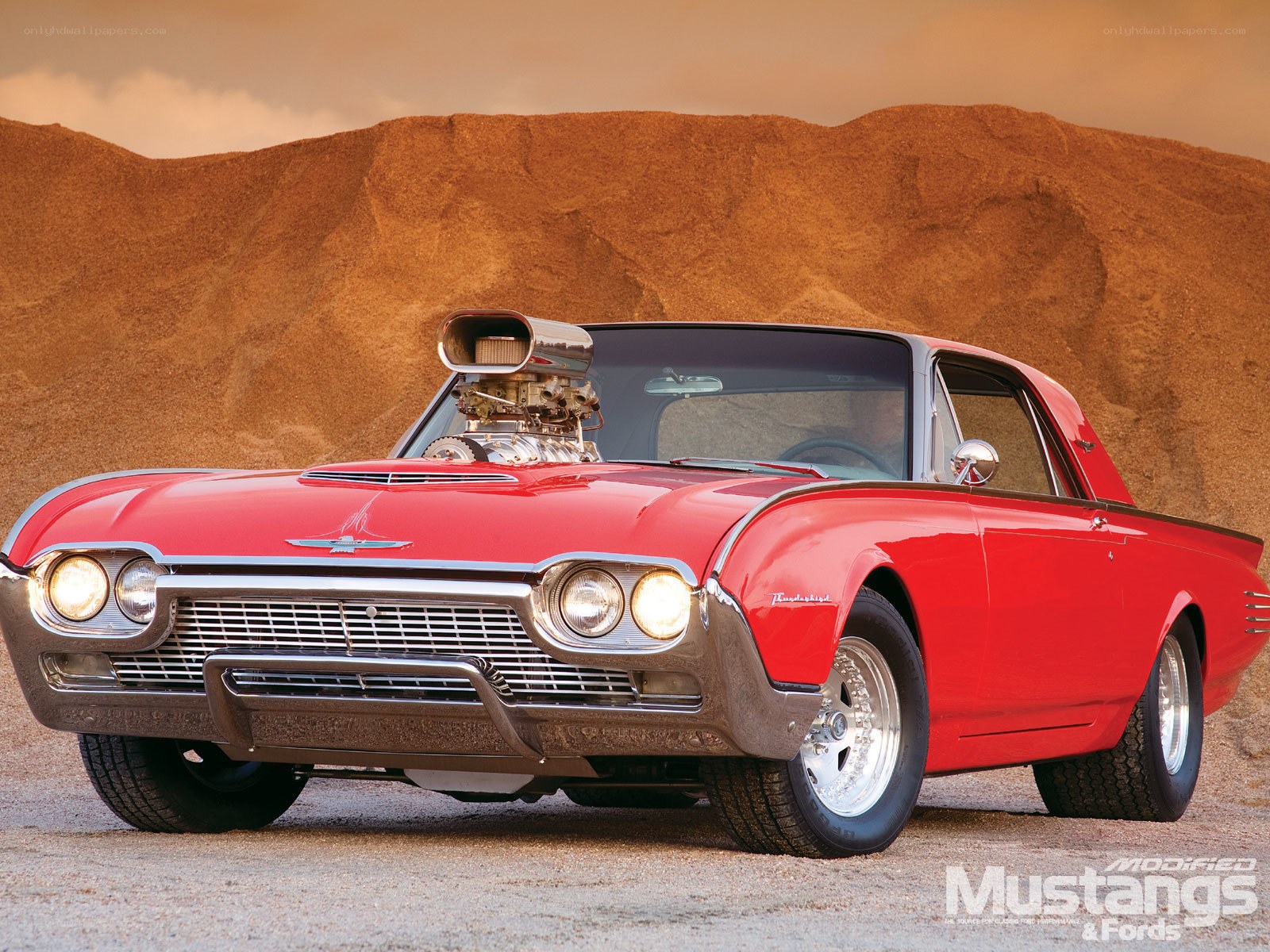 Red classic car with supercharged engine