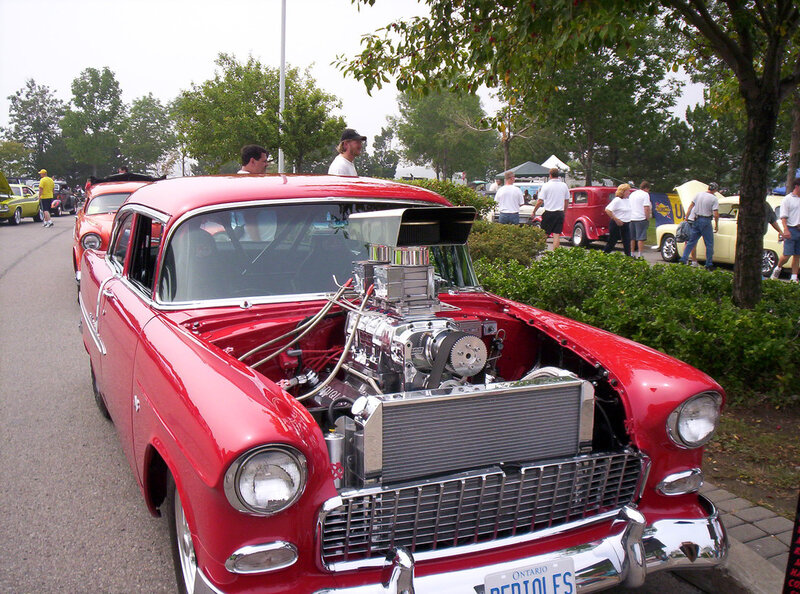 Red classic car with supercharged engine