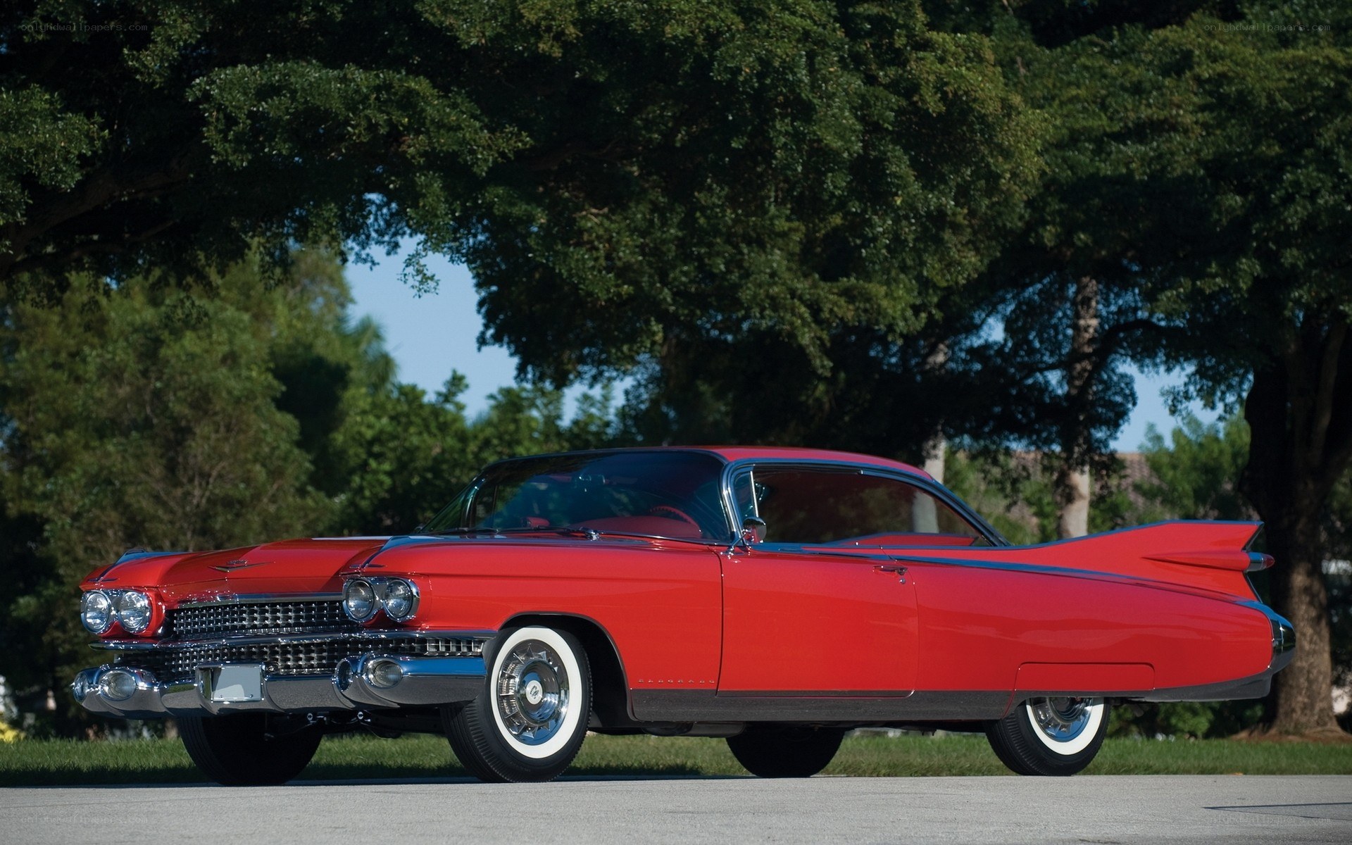 Red classic car with tailfins