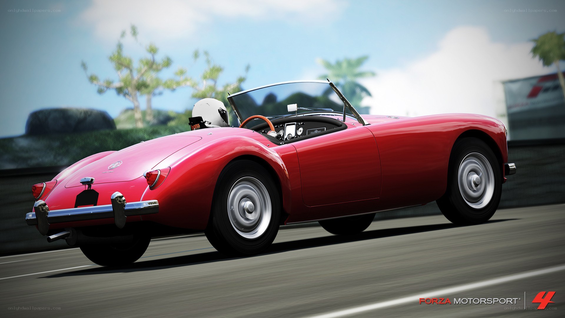 Red classic convertible on track